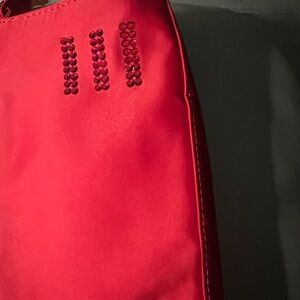 Espirit Vintage red clutch with jewelry attached